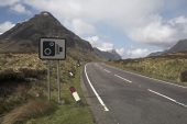 Stob Coire Raineach and speed camera sign beside the A82 road through the Pass of Glencoe Highland Region Scotland