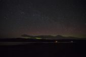 Night sky and aurora borealis from Loch na Keal Isle of Mull Inner Hebrides Argyll and Bute Scotland March 2017
