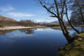 View across the River Scaddle Inverscalle with Ben Nevis beyond Loch Linnhe Argyll and Bute Highland Scotland March 2017