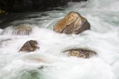 Rocks and rushing water Gave du Marcadau Pyrenees National Park France