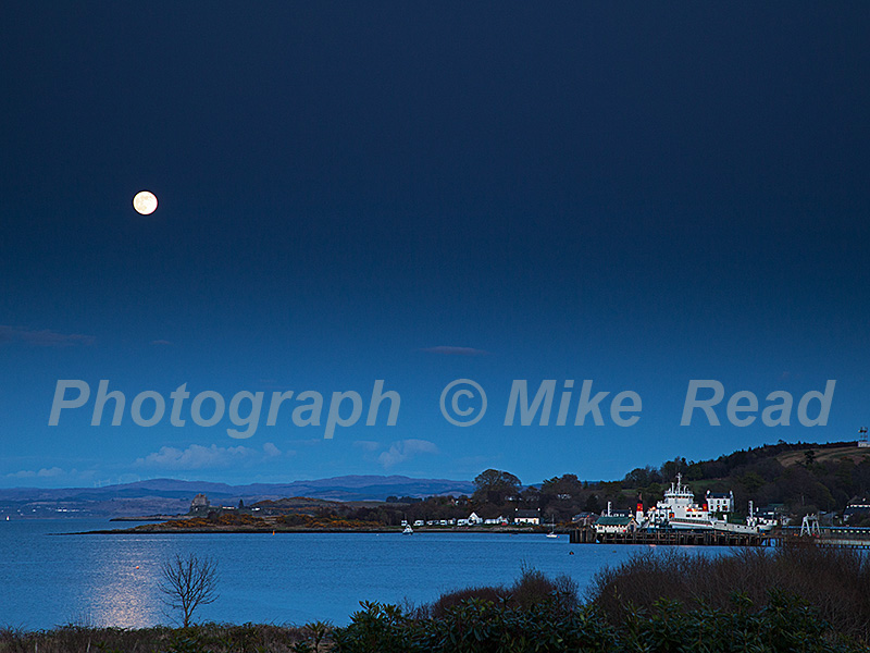 Moon rising over the Sound of Mull and the Craignure ferry port from the Isle of Mull Hotel, Argyll and Bute, Scotland, UK, April 2018