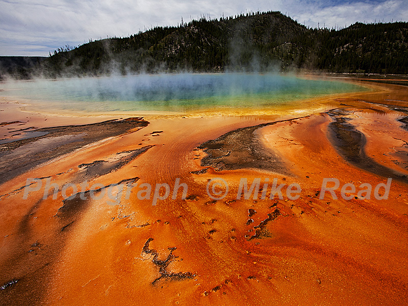 Grand Prismatic Spring with stair-step terraces in the foreground Midway Geyser Basin Yellowstone National Park Wyoming USA June 2015