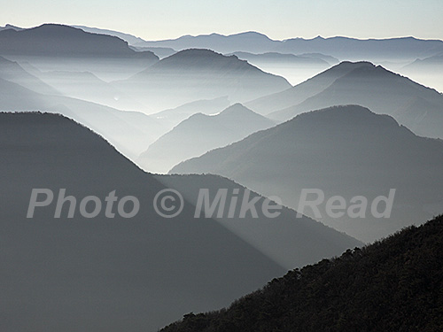 Mountains in mist at sunrise near the Col de Rousset Parc Naturel Regional du Vercors France